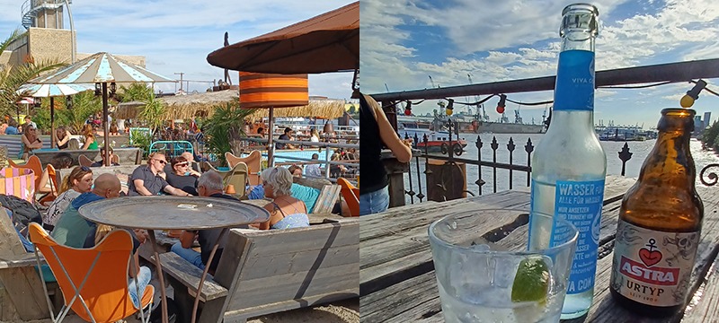 Hippe strandtent met mensen die genieten van het uitzicht over de Elbe